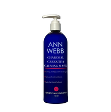 Load image into Gallery viewer, A 16 oz pump bottle of Ann Webb Charcoal Green Tea Calming Mask, featuring a deep cobalt blue bottle and a white pump dispenser, set against a plain white background.