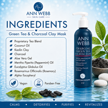 Load image into Gallery viewer, Ann Webb Skin Care Green Tea & Charcoal Clay Mask ingredients graphic with a bottle of the mask on the right, surrounded by tea leaves, charcoal, and stones on a blue water-textured background.