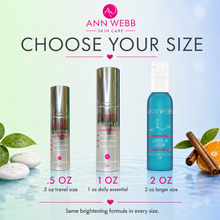 Load image into Gallery viewer, Ann Webb Skin Care size comparison graphic showing three bottles of the Brightening Serum: a .5 oz travel size with a silver cap, a 1 oz essential size with a clear cap, and a 2 oz larger size with a blue cap.