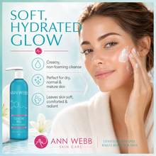 Load image into Gallery viewer, Ann Webb Cleansing Milk skincare ad showing a woman applying cream to her face next to the blue bottle, with text reading 'Soft, Hydrated Glow' and product benefits.