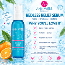 Load image into Gallery viewer, Ann Webb Skin Care Redless Relief Serum in a 2 oz blue bottle, presented on a light blue water-splash background with orange slices, leaves, and product feature callouts.