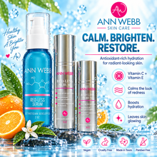 Load image into Gallery viewer, Three Ann Webb Skin Care Red-Less Serum products in blue and silver packaging, displayed on a water-splash background with oranges, leaves, and product feature callouts.