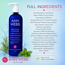 Load image into Gallery viewer, A bottle of Ann Webb Salicylic Cleanser on a light blue background with water splash graphics, alongside a full ingredients list and product benefits. The bottle is dark blue with a white pump, and the background features green leaves and pink text accents.