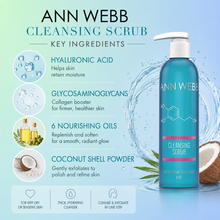 Load image into Gallery viewer, ANN WEBB Cleansing Scrub bottle on a light blue background with ingredient callouts and water splash graphics. The bottle is teal-blue with a white pump and pink label accents.