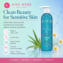 Load image into Gallery viewer, Ann Webb Skin Care Cleansing Milk bottle on a light blue background with promotional text and icons for sensitive skin benefits. The bottle is teal-blue with a white pump and silver branding.