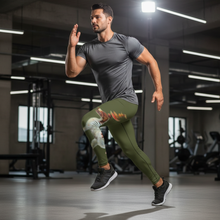 Load image into Gallery viewer, Mens Army Green Dexter the Walking Dog Leggings - Meggings Model wearing Dexter Leggings - Active Workout