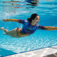 Load image into Gallery viewer, Women's Rash Guard Splash Whimsy Fit UPF 50+ Abstract Print Long Sleeve Swim Shirt Swimming action shot