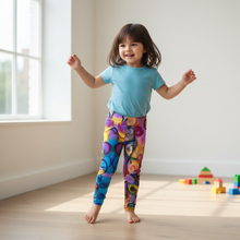 Load image into Gallery viewer, Toddler in colorful leggings - dancing pose