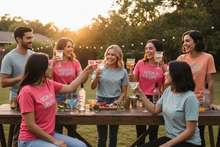 Load image into Gallery viewer, Women and men at house party in Vodka Helps shirts
