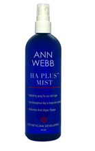 Load image into Gallery viewer, A 16 oz spray bottle of Ann Webb HA Plus+ Mist hydrating spray, featuring a deep blue bottle and a white spray nozzle, shown against a plain white background.
