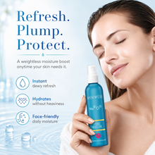 Load image into Gallery viewer, A woman in a white robe holds a blue Ann Weyers liquid moisture spray bottle against a light blue water-themed background with promotional text.
