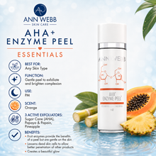 Load image into Gallery viewer, Ann Webb Skin Care AHA+ Enzyme Peel Essentials bottle shown on a bright skincare-themed background with product details and benefits listed on the left. The bottle is white with a silver cap and clear lower section, alongside sliced papaya, a cucumber, and orange slices.
