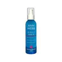 Load image into Gallery viewer, A 6 oz blue pump bottle of Ann Webb B5 Plus Serum with a clear cap, shown on a plain white background.
