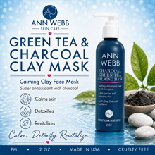 Load image into Gallery viewer, ANN WEBB SKIN CARE Green Tea &amp; Charcoal Clay Mask bottle on a blue water-themed background with text callouts and decorative stones.
