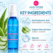 Load image into Gallery viewer, Ann Webb Skin Care Hyaluronic Serum bottle on a bright icy blue background with aloe leaves, bubbles, and ingredient callouts including dual hyaluronic acid, organic aloe leaf juice, and glycerin.
