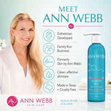 Load image into Gallery viewer, A promotional graphic for Ann Webb Skin Care featuring a smiling blonde woman on the left and a teal cleansing milk bottle on the right, with text highlighting product attributes and branding.
