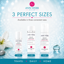 Load image into Gallery viewer, Three white bottles of Ann Webb Skin Care Night Moisture in .5 oz, 1 oz, and 2 oz sizes, displayed against a light blue water-themed background with decorative lily and bubble elements.
