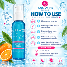 Load image into Gallery viewer, Ann Webb Red-Less Serum bottle in a clean, stylized graphic layout. The product is a 2 oz blue bottle with a white pump, set against a bright, water-themed background with an orange slice on the left.
