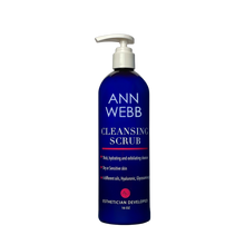 Load image into Gallery viewer, A 16 oz bottle of Ann Webb Cleansing Scrub with a white pump dispenser on a solid white background.
