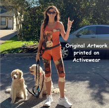 Load image into Gallery viewer, Ladies Burnt Orange Longhorn Leggings  Whimsy Fit Matching tank top Lady standing with Dogs
