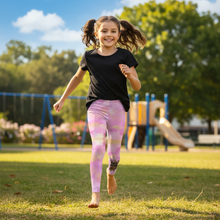 Load image into Gallery viewer, Girl Running in Cotton Candy Party Dog Leggings Whimsy Fit 
