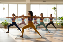 Load image into Gallery viewer, Whimsy Fit Women doing yoga in Breeze Bright sports bras
