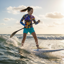 Load image into Gallery viewer, Breeze Bright Girls Rash Guard Whimsy Fit UPF 50+ Long Sleeve Swim Shirt- Teen Action Shot
