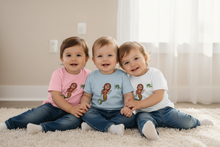 Load image into Gallery viewer, Three babies in pink, light blue, and white shirts
